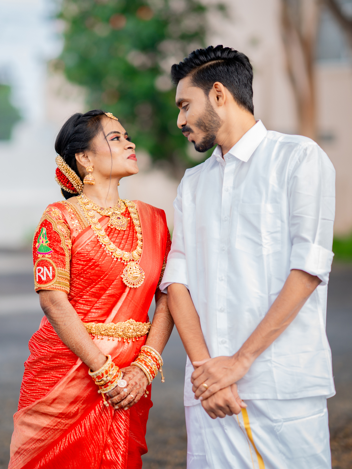 Romantic outdoor couple portrait of Nisha and Rudhresh by AK Photography Gobichettipalayam