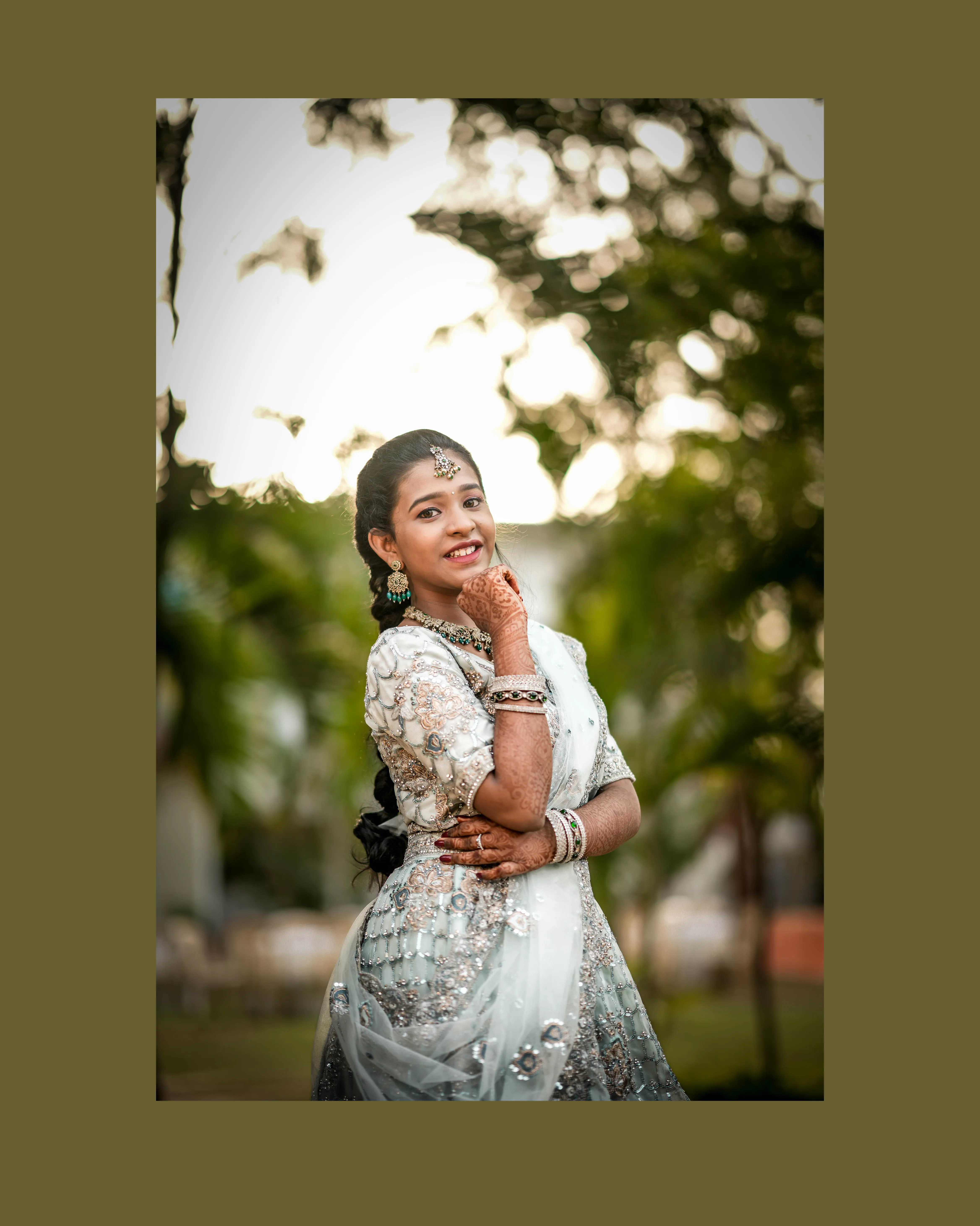 Candid portrait of Prathiksha wearing traditional saree and jewelry