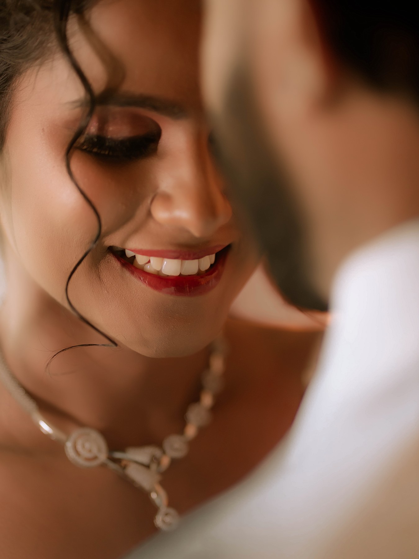 Joyful wedding moments and laughter of bride and groom captured by best candid photographer in Coimbatore