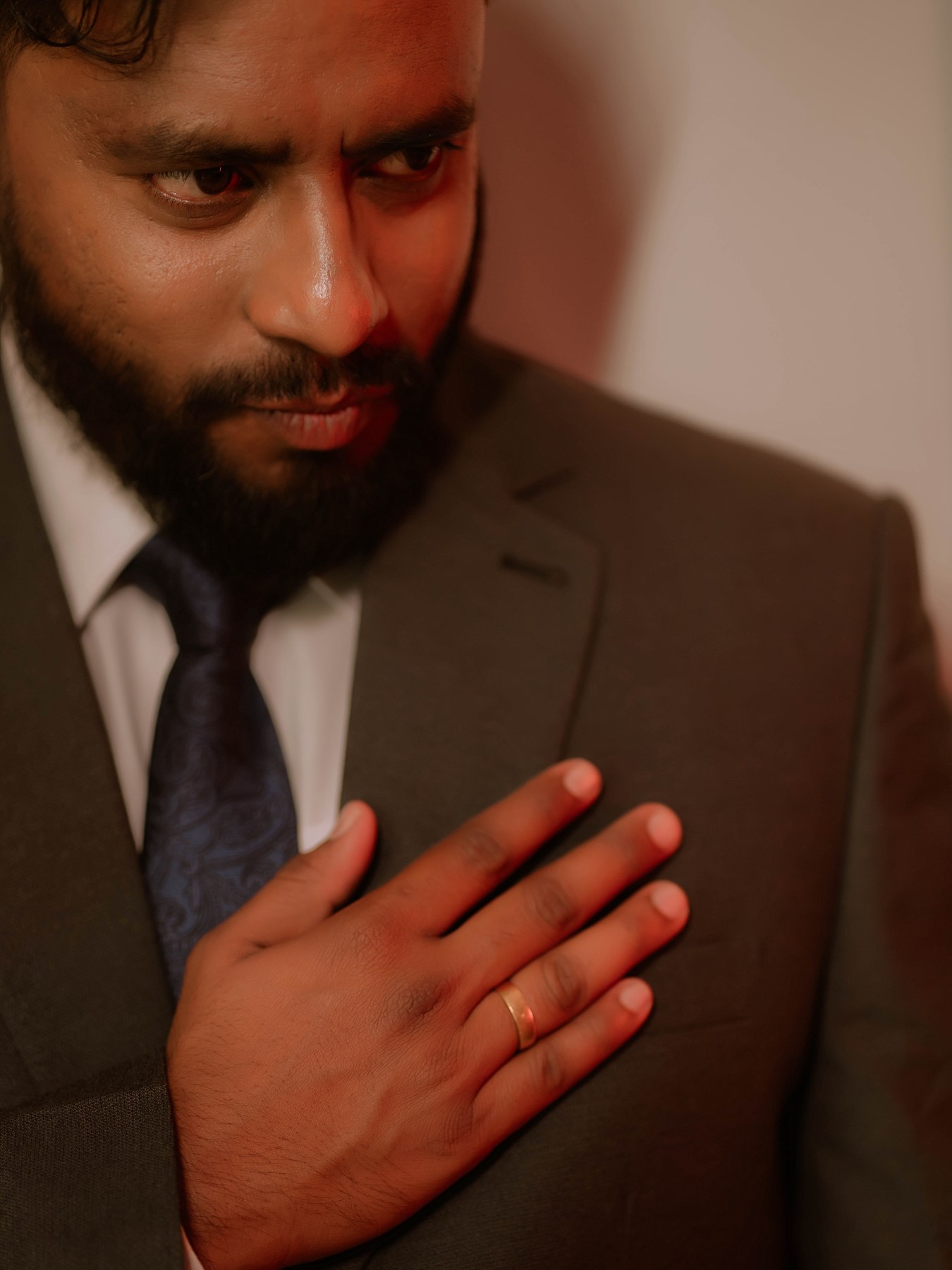 Christian groom portrait showcasing wedding ring of Rumanes David by AK Photography Coimbatore