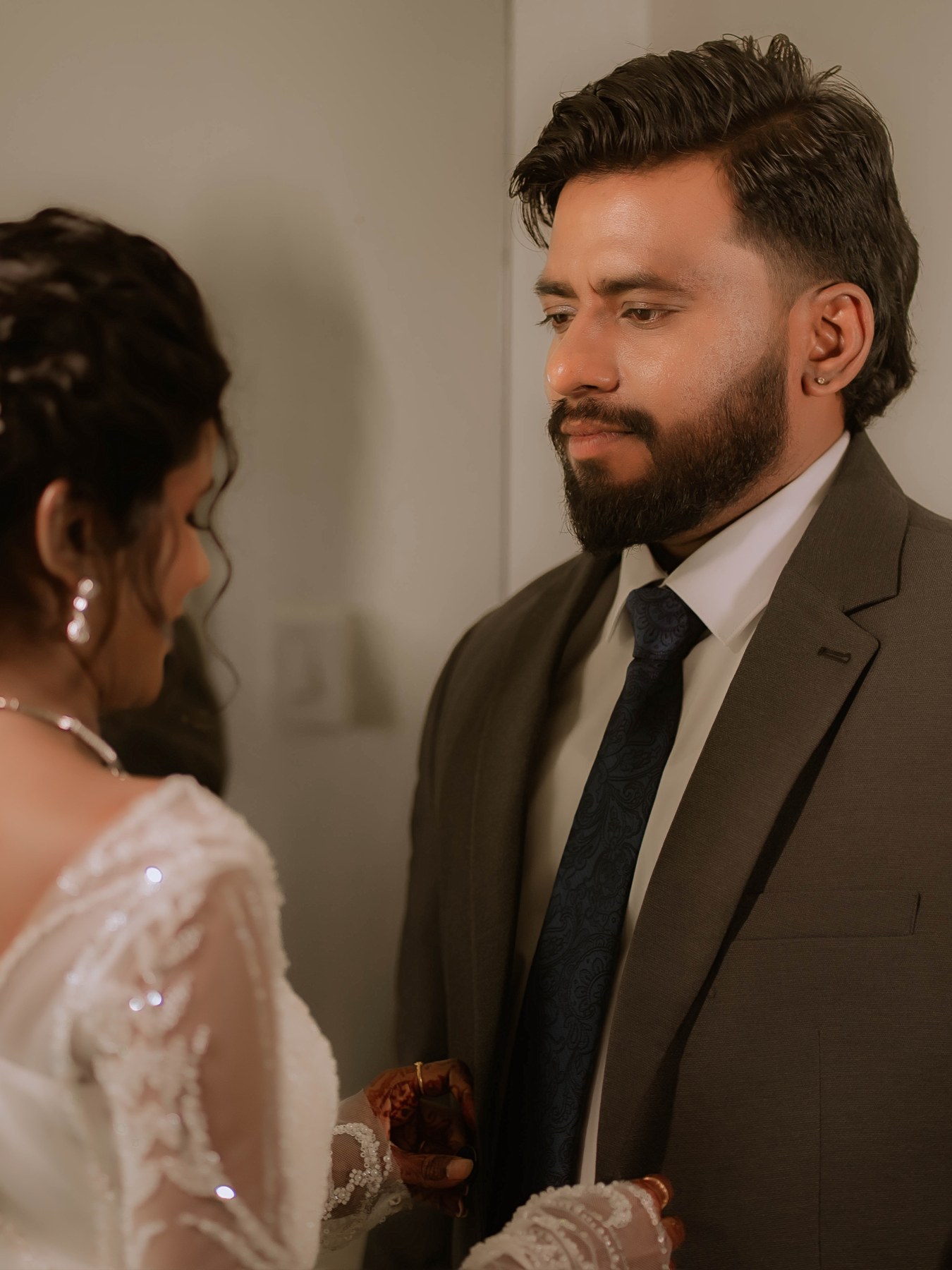 Candid couple portrait of Darthy Mony and Rumanes David in Coimbatore by AK Photography