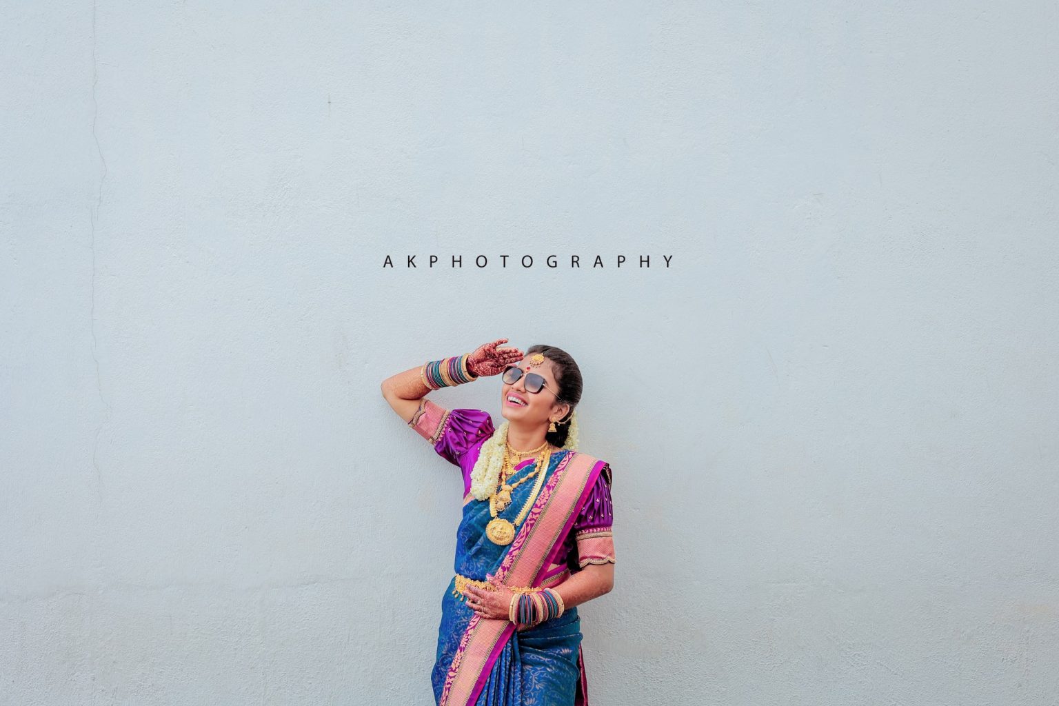 Bride and groom smiling happily at their traditional engagement in Coimbatore