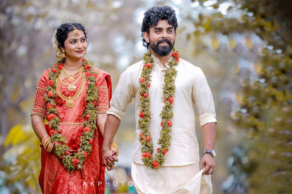 Candid bride smiling during South Indian wedding celebration in Coimbatore
